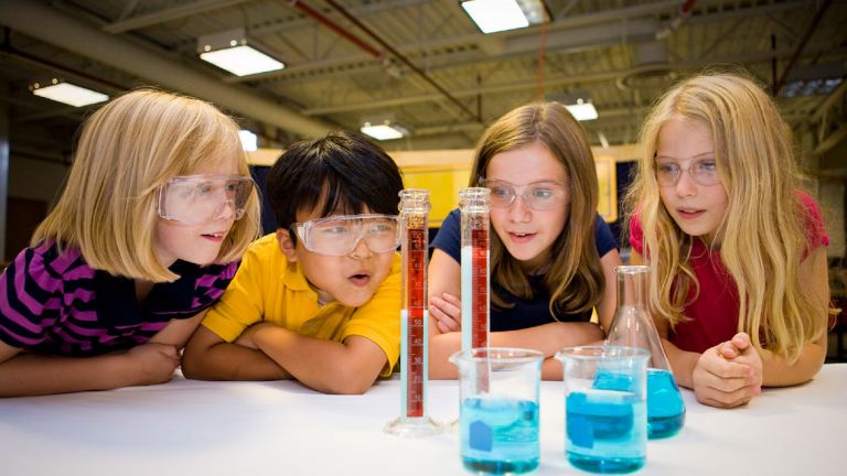 Five children performing Informal Science